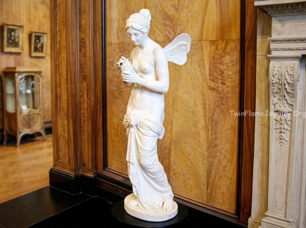 Psyche, a figure from Greek mythology representing the human soul, often depicted with butterfly wings. 