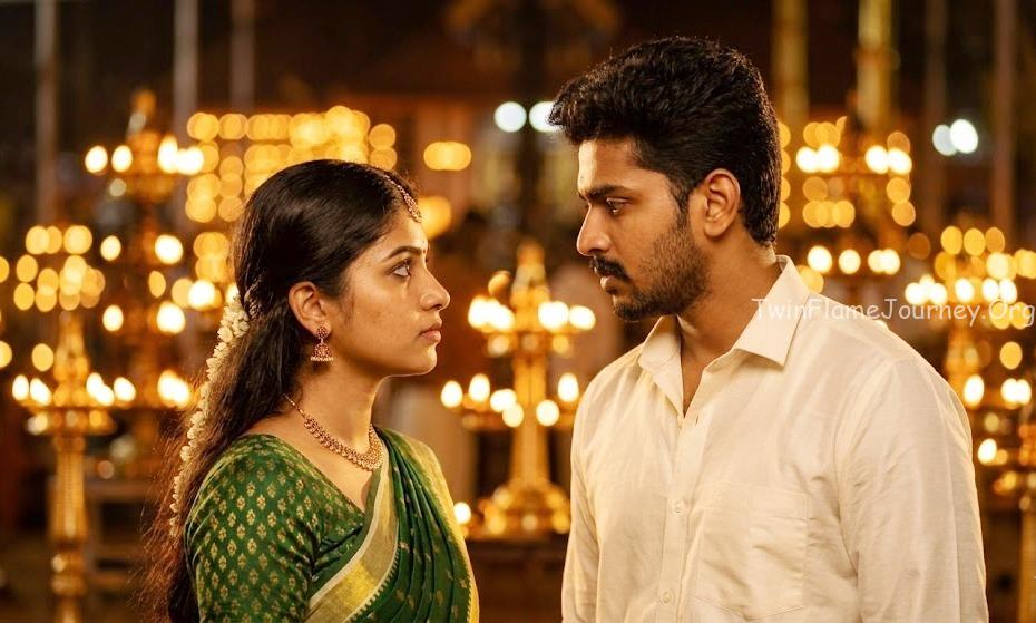 Soul recognition between a South Indian Twin Flame couple in a warm temple setting.