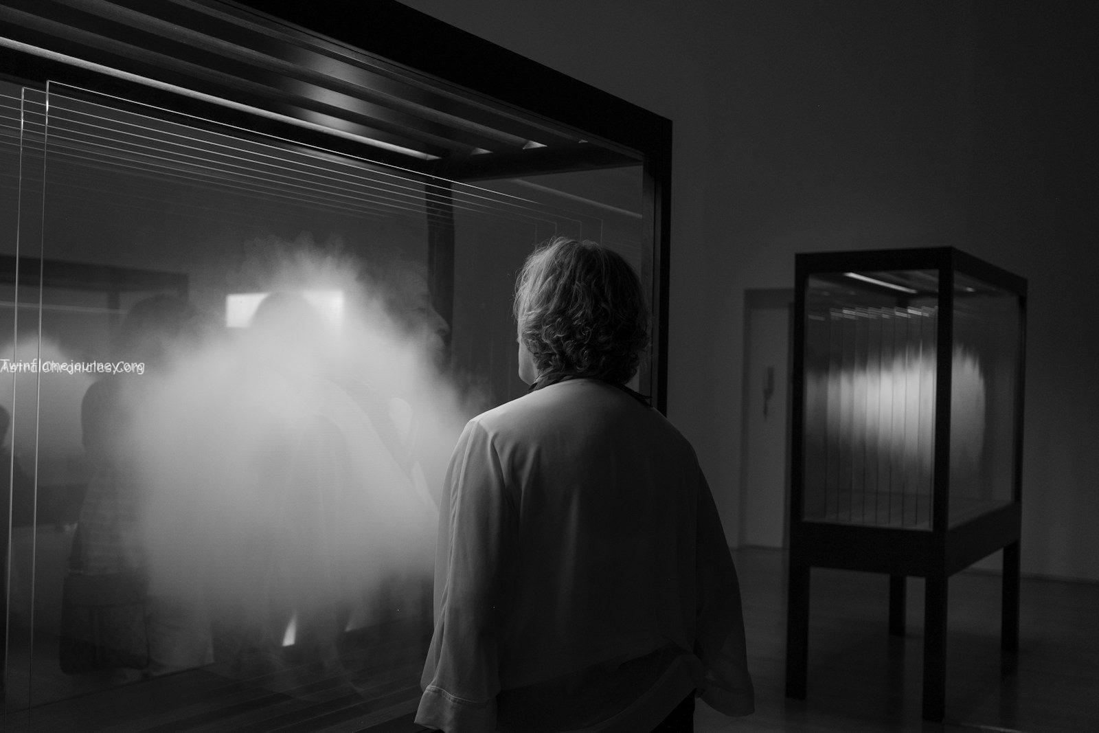 grayscale photography of person wears jacket